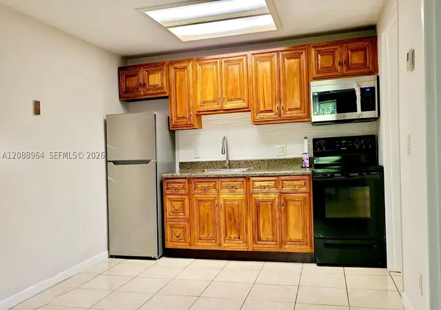 Photo 3 of Condo for sale at 7210 Southgate Blvd #7210, Tamarac, FL 33321 | MLS# A12088964 | Listing updated on 2026-09-15