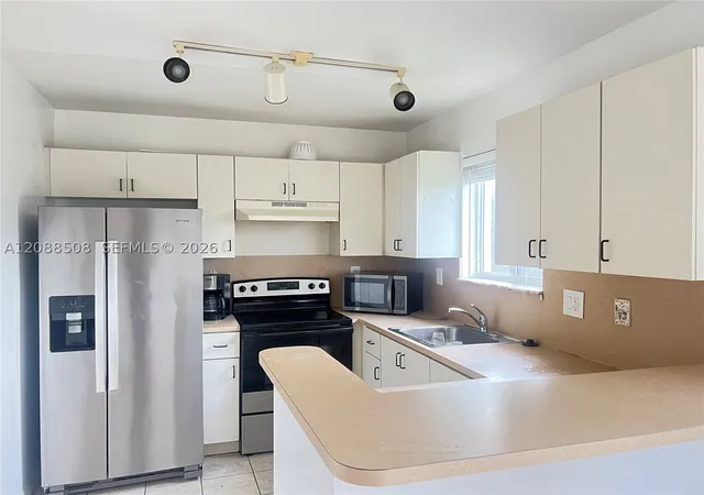 Photo 2 of Condo for sale at 3390 Ne 9th Street #201, Homestead, FL 33033 | MLS# A12088508 | Listing updated on 2026-09-15