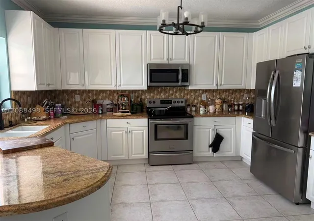 Photo 3 of Single family home for sale at 1423 Sw 158th Avenue, Pembroke Pines, FL 33027 | MLS# A12088498 | Listing updated on 2026-09-15