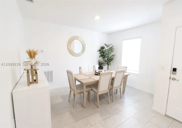 Photo 3 of Single family home for sale at 702 Sw Aster Rd, Port St Lucie, FL 34953 | MLS# A12089239 | Listing updated on 2026-09-15