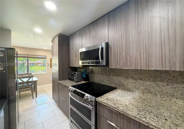 Photo 3 of Townhouse for sale at 10875 Nw 29th Mnr, Sunrise, FL 33322 | MLS# A12089301 | Listing updated on 2026-09-15