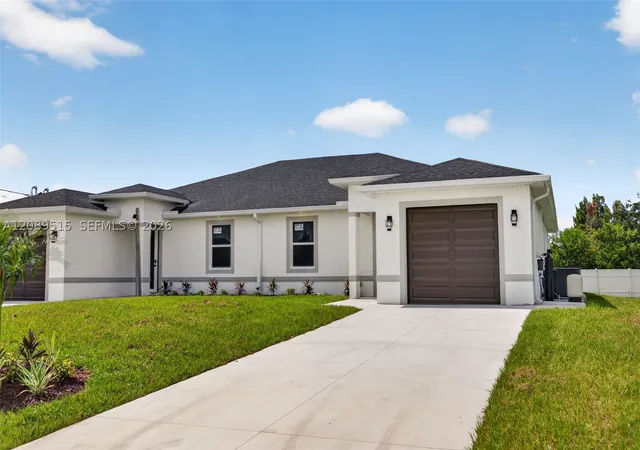 Photo 2 of Multi family home for sale at 1136/1138 S Gilbert Ave, Lehigh Acres, FL 33973 | MLS# A12089515 | Listing updated on 2026-10-07