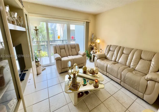 Photo 1 of Condo for sale at 30 Nw 87th Avenue #C219, Miami, FL 33172 | MLS# A12060402 | Listing updated on 2026-09-16