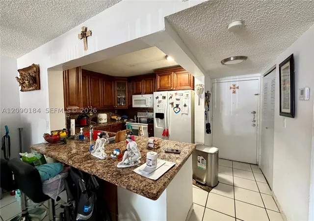 Photo 1 of Condo for sale at 5201 Nw 7th Street #104, Miami, FL 33126 | MLS# A12090184 | Listing updated on 2026-09-16