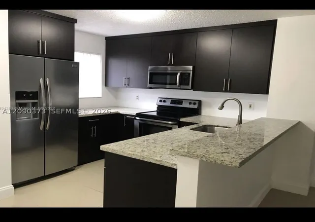 Photo 3 of Condo for sale at 8730 N Sherman Cir #302, Miramar, FL 33025 | MLS# A12090373 | Listing updated on 2026-09-17