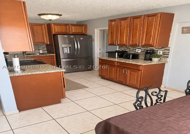 Photo 1 of Single family home for sale at 5871 NW 41st Terrace, North Lauderdale, FL 33319 | MLS# A12090046 | Listing updated on 2026-09-17