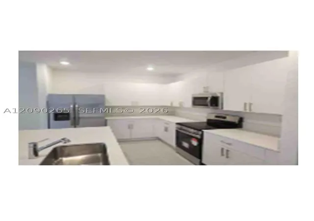 Photo 4 of Townhouse for sale at 12891 SW 243rd Terrace, Homestead, FL 33032 | MLS# A12090265 | Listing updated on 2026-09-17