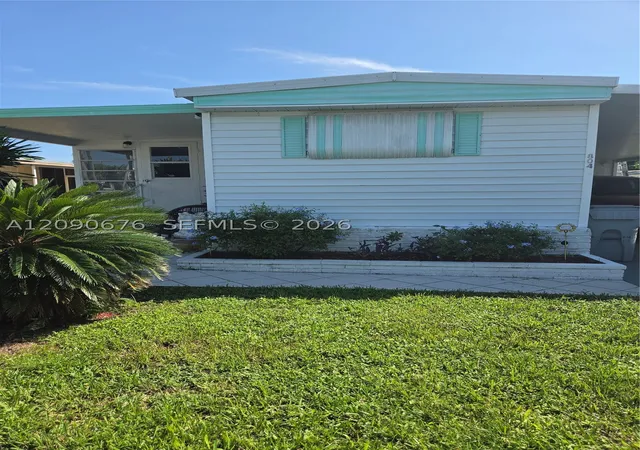 Photo 1 of Manufactured home for sale at 804 Par Dr, Pompano Beach, FL 33069 | MLS# A12090676 | Listing updated on 2026-09-17