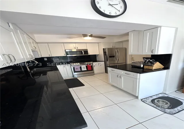 Photo 2 of Single family home for sale at 7190 E Tropical Way, Plantation, FL 33317 | MLS# A12089573 | Listing updated on 2026-09-22