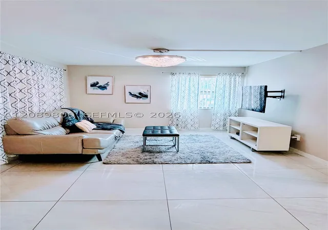 Photo 1 of Condo for sale at 20120 Ne 3rd Court #7, Miami, FL 33179 | MLS# A12089806 | Listing updated on 2026-09-17