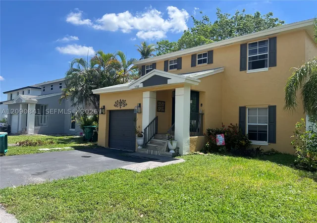 Photo 1 of Single family home for sale at 5788 Woodland Point Dr, Tamarac, FL 33319 | MLS# A12090841 | Listing updated on 2026-09-17