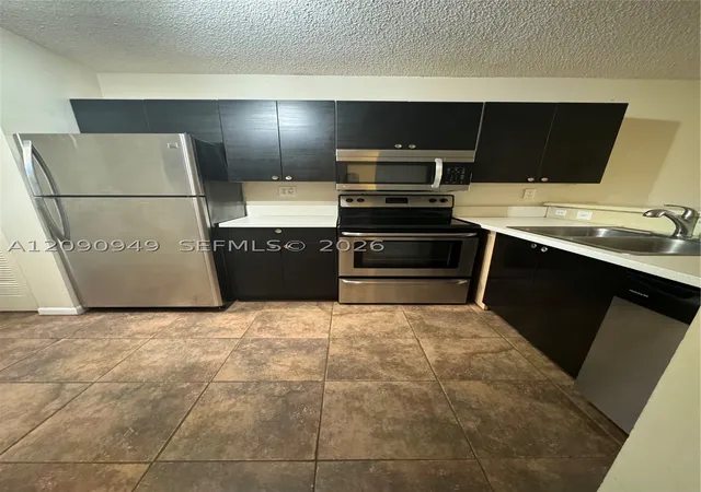 Photo 3 of Condo for sale at 9969 Nob Hl Ct #9969, Sunrise, FL 33351 | MLS# A12090949 | Listing updated on 2026-10-06