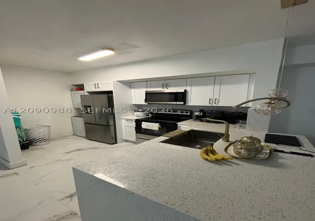 Photo 3 of Condo for sale at 5077 Nw 7th Street #912, Miami, FL 33126 | MLS# A12090988 | Listing updated on 2026-09-17
