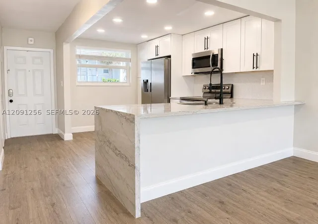 Photo 1 of Condo for sale at 1701 Nw 75th Avenue #104, Plantation, FL 33313 | MLS# A12091256 | Listing updated on 2026-09-24