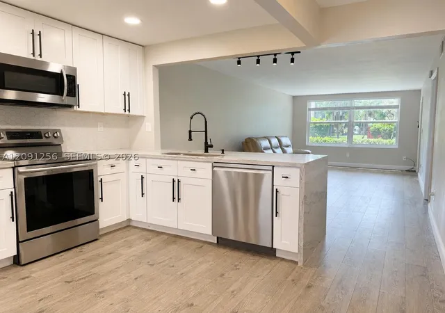 Photo 2 of Condo for sale at 1701 Nw 75th Avenue #104, Plantation, FL 33313 | MLS# A12091256 | Listing updated on 2026-09-24