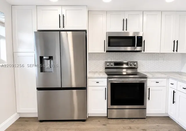 Photo 3 of Condo for sale at 1701 Nw 75th Avenue #104, Plantation, FL 33313 | MLS# A12091256 | Listing updated on 2026-09-24