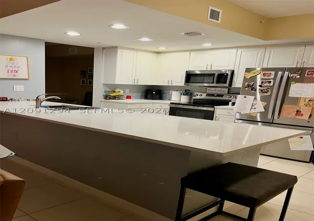 Photo 1 of Condo for sale at 7735 Yardley Dr #213, Tamarac, FL 33321 | MLS# A12091294 | Listing updated on 2026-09-29
