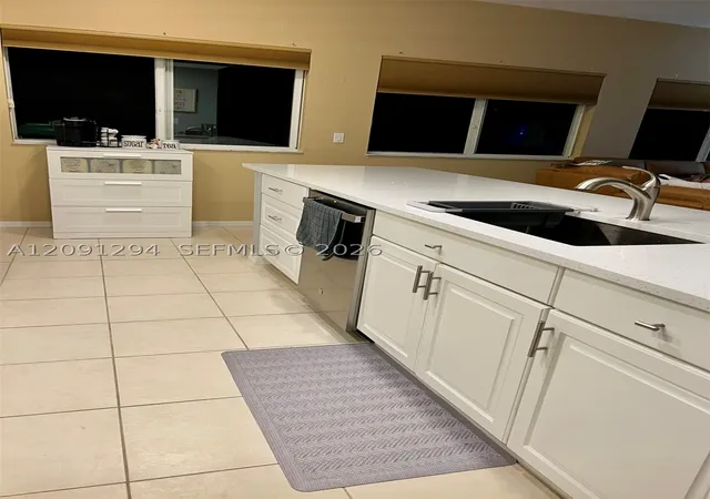 Photo 2 of Condo for sale at 7735 Yardley Dr #213, Tamarac, FL 33321 | MLS# A12091294 | Listing updated on 2026-09-29