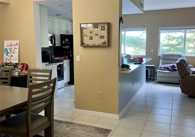 Photo 3 of Condo for sale at 7735 Yardley Dr #213, Tamarac, FL 33321 | MLS# A12091294 | Listing updated on 2026-09-29