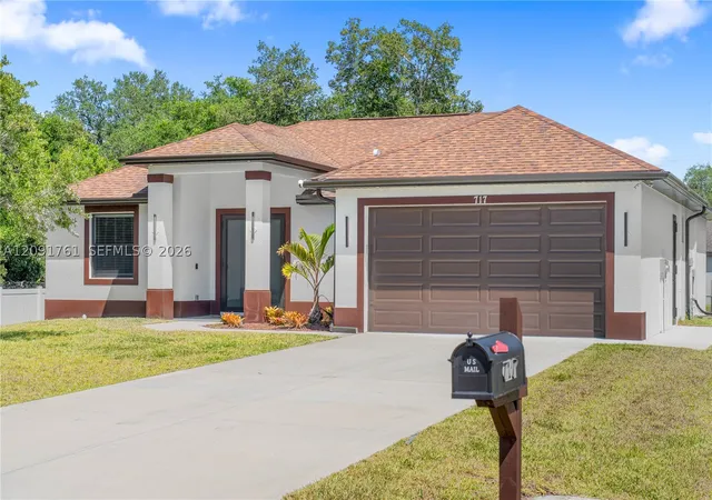 Photo 1 of Single family home for sale at 165 Patio St, Lehigh Acres, FL 33974 | MLS# A12091761 | Listing updated on 2026-09-18