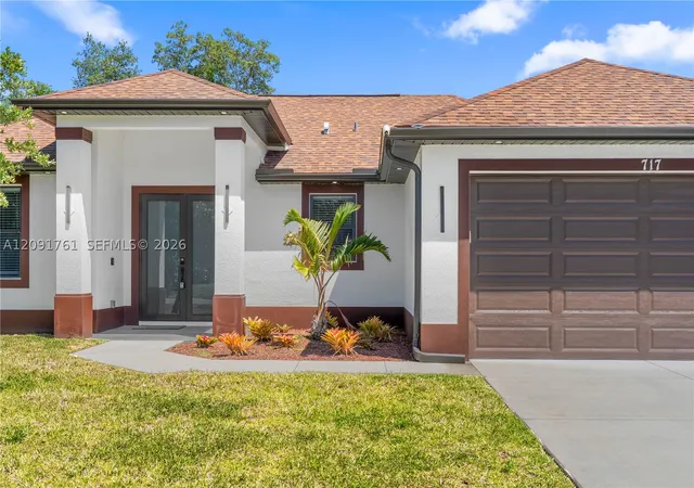 Photo 2 of Single family home for sale at 165 Patio St, Lehigh Acres, FL 33974 | MLS# A12091761 | Listing updated on 2026-09-18
