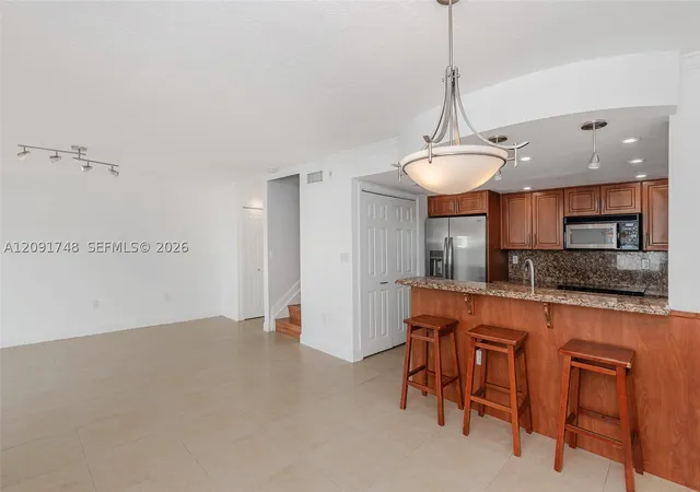 Photo 3 of Townhouse for sale at 4520 Sw 68th Court Cir #25-5, Miami, FL 33155 | MLS# A12091748 | Listing updated on 2026-09-18