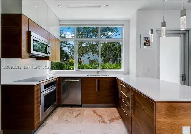 Photo 2 of Townhouse for sale at 548 Fernwood Rd #548, Key Biscayne, FL 33149 | MLS# A12091112 | Listing updated on 2026-09-19