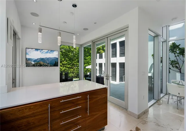 Photo 3 of Townhouse for sale at 548 Fernwood Rd #548, Key Biscayne, FL 33149 | MLS# A12091112 | Listing updated on 2026-09-19