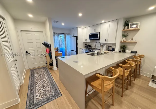 Photo 1 of Townhouse for sale at 844 Banks Rd, Coconut Creek, FL 33063 | MLS# A12092455 | Listing updated on 2026-09-20