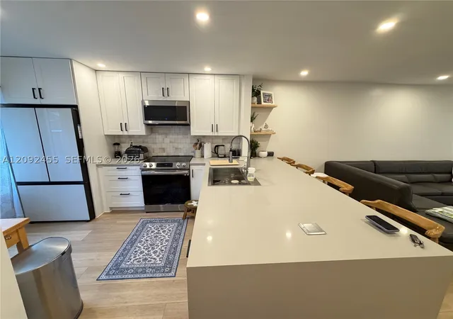 Photo 3 of Townhouse for sale at 844 Banks Rd, Coconut Creek, FL 33063 | MLS# A12092455 | Listing updated on 2026-09-20