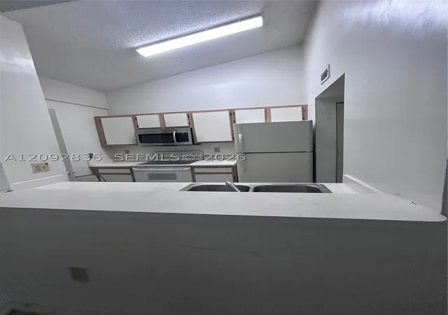 Photo 1 of Condo for sale at 2890 N Oakland Forest Dr #202, Oakland Park, FL 33309 | MLS# A12092836 | Listing updated on 2026-09-21