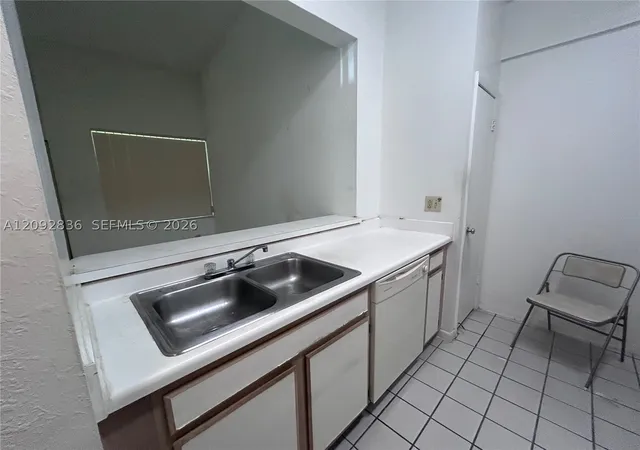 Photo 3 of Condo for sale at 2890 N Oakland Forest Dr #202, Oakland Park, FL 33309 | MLS# A12092836 | Listing updated on 2026-09-21