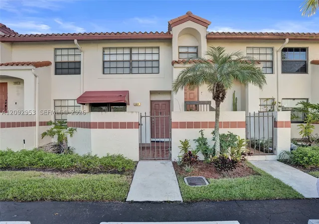 Photo 1 of Townhouse for sale at 105 Liberty Ct, Deerfield Beach, FL 33442 | MLS# A12092953 | Listing updated on 2026-09-22