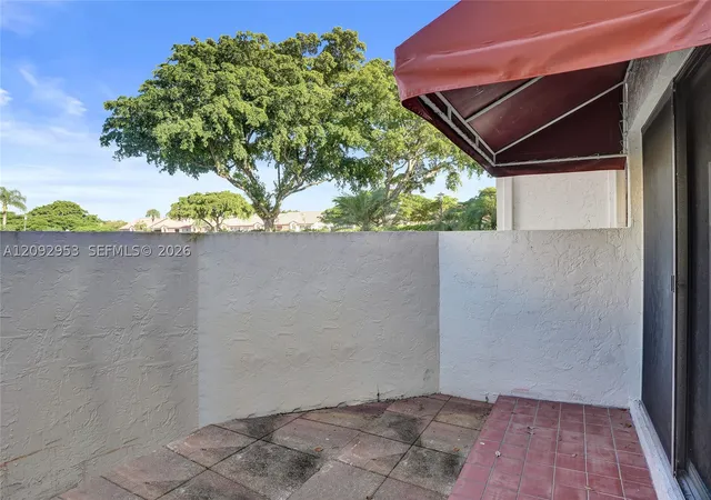 Photo 3 of Townhouse for sale at 105 Liberty Ct, Deerfield Beach, FL 33442 | MLS# A12092953 | Listing updated on 2026-09-22
