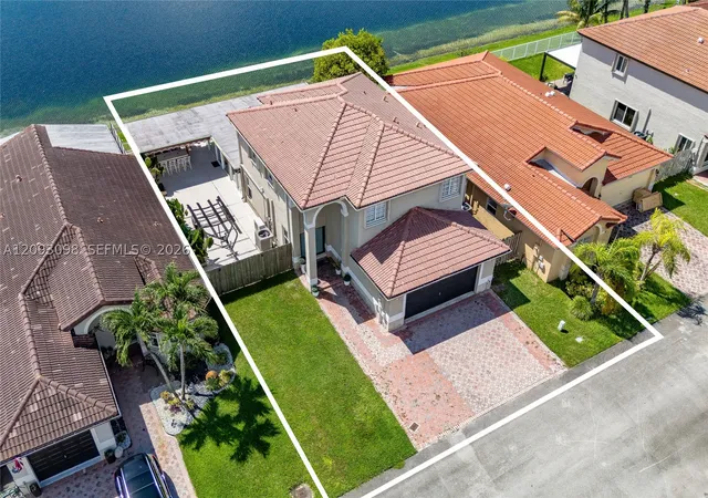 Photo 2 of Single family home for sale at 12028 Sw 133rd Terrace, Miami, FL 33186 | MLS# A12093098 | Listing updated on 2026-09-21