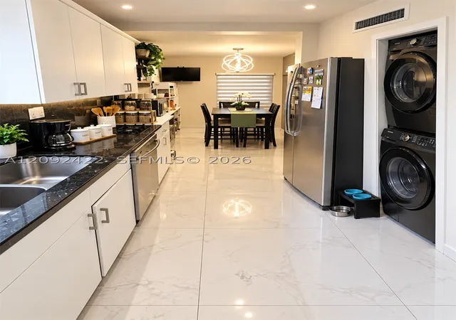 Photo 2 of Townhouse for sale at 7114 SW 113th Avenue, Miami, FL 33173 | MLS# A12092422 | Listing updated on 2026-09-22
