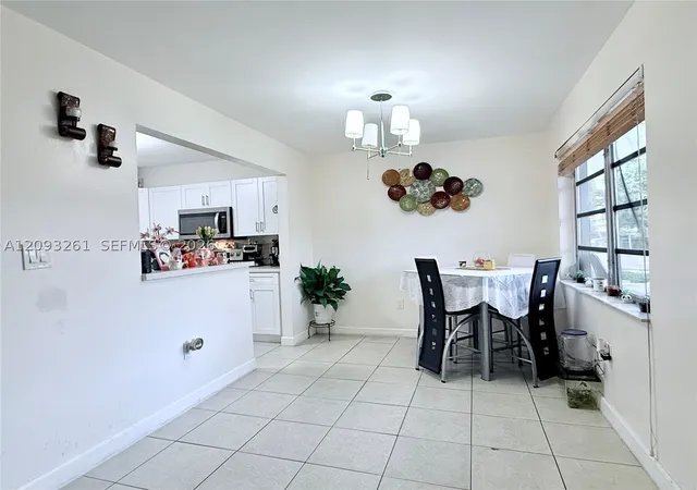 Photo 3 of Condo for sale at 1284 W 44th Place #1, Hialeah, FL 33012 | MLS# A12093261 | Listing updated on 2026-09-26