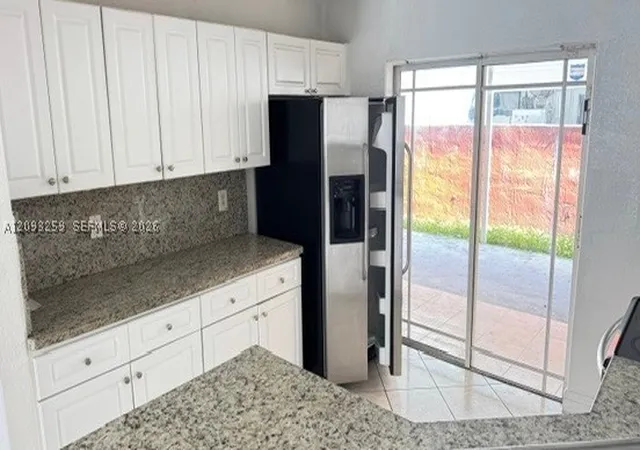 Photo 3 of Condo for sale at 11051 W Okeechobee Rd #101, Hialeah Gardens, FL 33018 | MLS# A12093259 | Listing updated on 2026-10-02