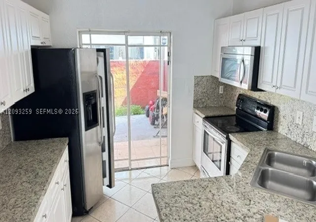 Photo 3 of Condo for sale at 11051 W Okeechobee Rd #101, Hialeah Gardens, FL 33018 | MLS# A12093259 | Listing updated on 2026-10-02