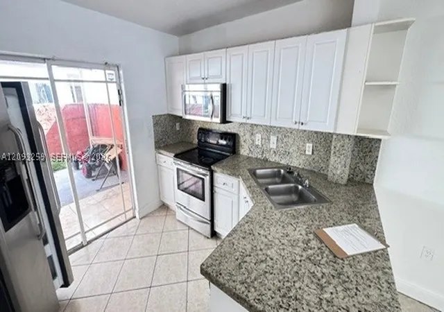 Photo 4 of Condo for sale at 11051 W Okeechobee Rd #101, Hialeah Gardens, FL 33018 | MLS# A12093259 | Listing updated on 2026-10-02