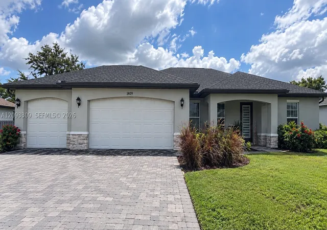 Photo 1 of Single family home for sale at 1409 Southwest 19th, Cape Coral, FL 33991 | MLS# A12093309 | Listing updated on 2026-09-25