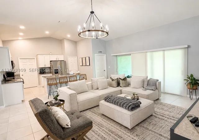 Photo 3 of Single family home for sale at 1409 Southwest 19th, Cape Coral, FL 33991 | MLS# A12093309 | Listing updated on 2026-09-25