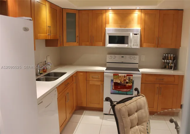 Photo 1 of Condo for sale at 3980 Oaks Clubhouse Dr #110, Pompano Beach, FL 33069 | MLS# A12090525 | Listing updated on 2026-09-29