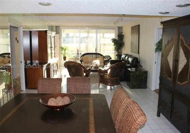 Photo 2 of Condo for sale at 3980 Oaks Clubhouse Dr #110, Pompano Beach, FL 33069 | MLS# A12090525 | Listing updated on 2026-09-29