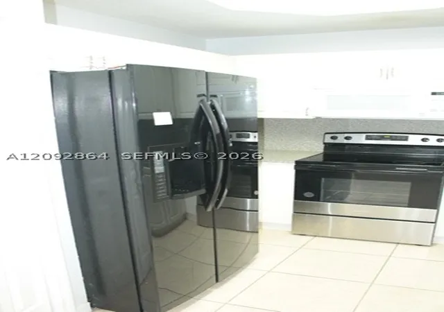 Photo 3 of Condo for sale at 10666 Sw 7th Street #2106, Pembroke Pines, FL 33025 | MLS# A12092864 | Listing updated on 2026-09-22