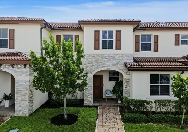 Photo 1 of Townhouse for sale at 12201 NW 23rd Court, Miami, FL 33167 | MLS# A12093644 | Listing updated on 2026-09-22