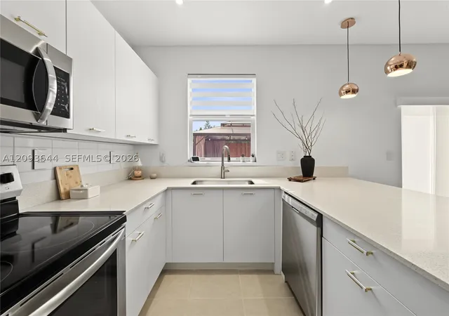 Photo 3 of Townhouse for sale at 12201 NW 23rd Court, Miami, FL 33167 | MLS# A12093644 | Listing updated on 2026-09-22