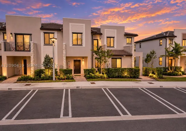 Photo 1 of Townhouse for sale at 957 Ne 211th Street, Miami, FL 33179 | MLS# A12090419 | Listing updated on 2026-09-22
