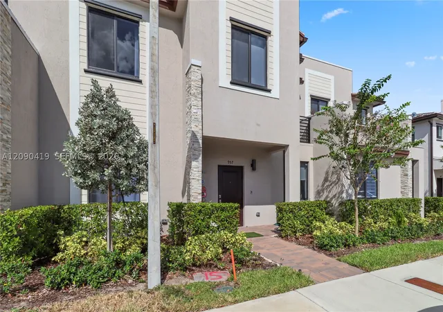 Photo 2 of Townhouse for sale at 957 Ne 211th Street, Miami, FL 33179 | MLS# A12090419 | Listing updated on 2026-09-22