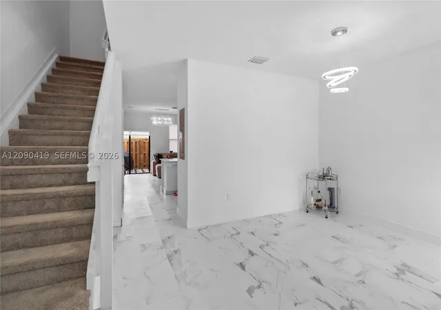 Photo 3 of Townhouse for sale at 957 Ne 211th Street, Miami, FL 33179 | MLS# A12090419 | Listing updated on 2026-09-22